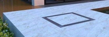 Tampa para Casa de Máquinas integrada ao revestimento do piso
